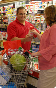 Employee helping a customer